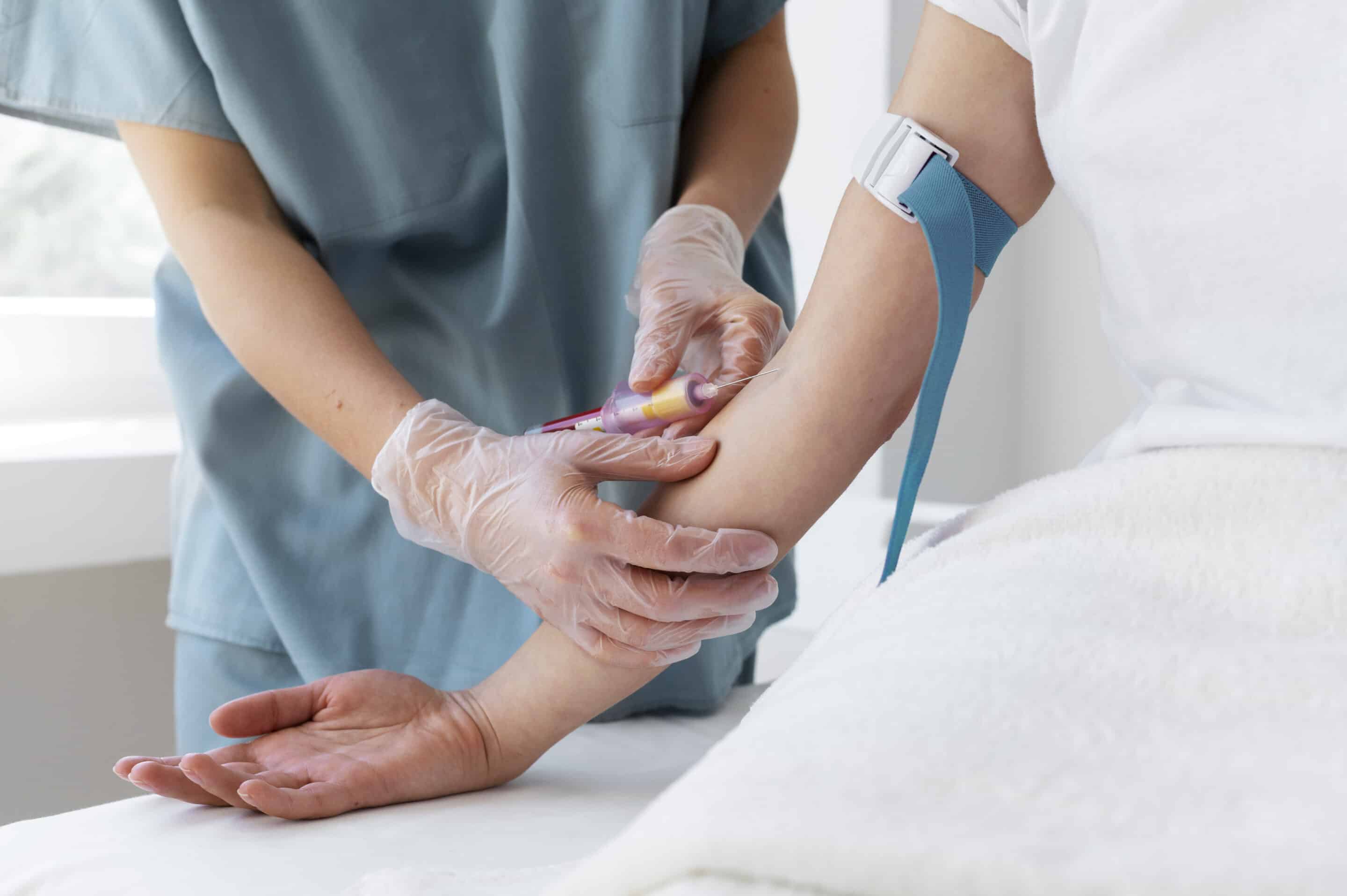 high-angle-health-professional-drawing-blood-prp-treatment